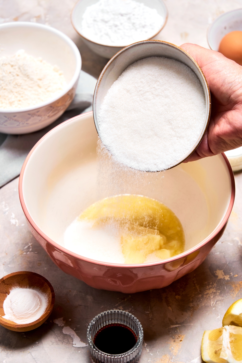 A mixing bowl with the butter and sugar being combined.